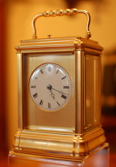 A Sterling Silver Carriage clock , Hump Back shape with a high quality jewelled lever escapement .  