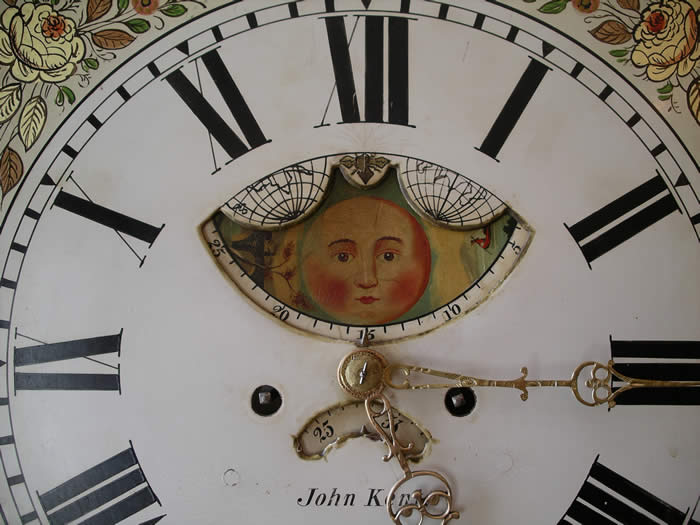 A substantial and well proportioned highly figured mahogany longcase with a painted dial showing phases of the moon below the twelve ,8 day duration striking the hours on a bell. The case has good detail with canted corners to the base , bracket feet , a book matched trunk door with shaped edge , a cushion shaped decorated panel below the swan neck pediment . John Kent of Salford , Manchester was working from 1804 and is listed in Clock and Watchmakers of the World , book by Loomes . fully restored and sold with a one year guarantee 
