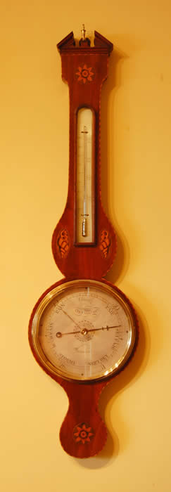 Barometer by Ortelli , silvered dials finely engraved with rope edge  