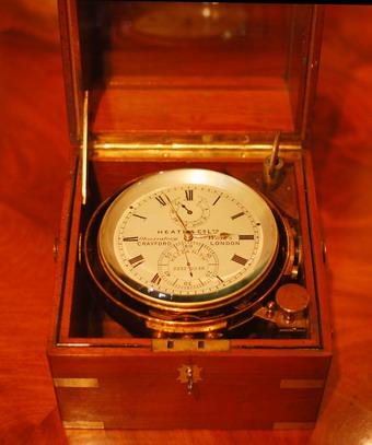 A superb cased marine chronometer with mahogany brass bound box with original lid and name plate , a silvered dial with the makers name , Heath & Co , Observatory works ,Crayford, London and numbered 2232-2248 on the dial and on the plate to the case .The dail also has the inscription 'Hezzanith' which was the name given to Heath & Co's Premium range of Nautical instruments and was a guarantee of quality , they also were appointed to the Lords commissioners to the Admiralty .The mahogany Chronometer box is brass bound with flush carry handles and Ivory name plate Key and lock . The Jewelled spring Detent escapement and movement is now fully overhauled and keeping very good time . 