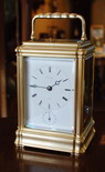 A fine 'Grande Sonnerie' carriage clock in a gilt gorge case with a white enamel dial and unusually signed Henri Jacot , Paris . This clock has been fully restored , serviced and regulated . Grande Sonnerie striking , Petite Sonnerie and fully Silent if you wish . A very good , large gorge case which feels reassuringly heavy and thick bevelled glass panels to all sides . This clock also features an alarm with a selection lever to the base . Circa 1880