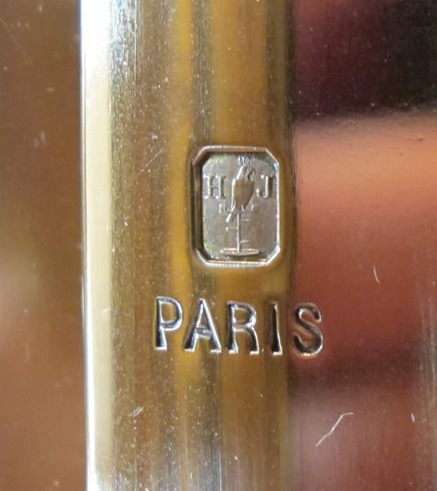 Henri Jacot Logo showing the Parrot and H - J quite clearly .