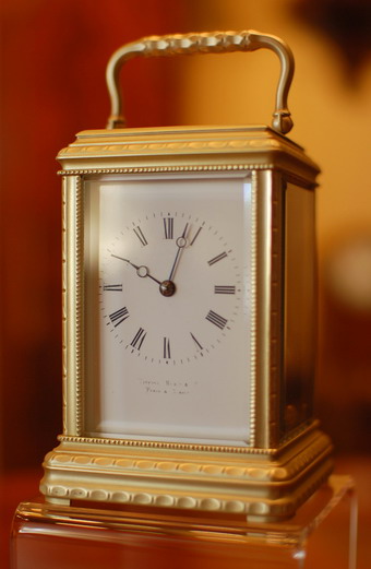 An unusual shaped and faceted , decorative gorge case Carraige clock in very original condition with a large top glass to view the original Bi-metallic ,Silvered & Jewelled lever platform escapement , the clock retains its white Glass all of which have been bevelled and in perfect condition . This carriage clock is signed on the Dial , Tiffany  Reed & Co , Paris and Geneva . Tiffany Reed & Co opened at 79 Rue de Richelieu after forming a partnership with G.F.T Reed in 1850 and by 1853 Charles Louis Tiffany had renamed the store Tiffany and Co , so we can safely date this clock to within three years . Tiffany often used Drocourt to make their clocks and upon initial inspection this appears so . The clock strikes on the hour on a gong and once for the half hour , more pictures will follow on completion of servicing / overhauling the movement .