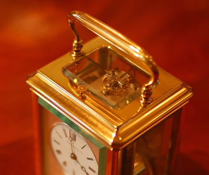 A good sized , well proportioned , gilt cannalee cased , Petite sonnerie carriage clock with silvered dial mask in very original condition with a large top glass to view the original Bi-metallic , jewelled lever escapement . Gong striking on the Hour and as with Petite Sonnerie you also have the quarter , half and three-quarter strike on two gongs . The movement is completely original and serviced , cleaned and polished and sold with a full 12 month guarantee . The extra thick , white bevelled glasses are all in superb condition . The dial showing Roman numerals with the retailers name Tiffany & Co and the blued steel Breguet hands . Push repeat , Grande sonnerie on demand . Circa 1905-10 .