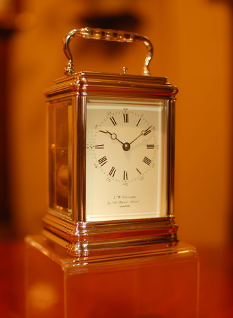 A superb Carriage clock with Push repeat facility in white / Rhodium  