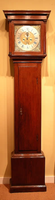 A slim solid oak Longcase clock by J.Green of Althorpe ( the resting place of Princess Diana ) circa 1720 . The full brass dial showing silvered Chapter ring with fleur de lys between the Roman numerals and quarter hour markers within , seconds and date aperture decorated with and engraved Basket of Plenty and ringed winding holes with a matted centre and Blued steel hands . The case is of good proportions being only 82 inches tall . The trunk door long and narrow with a brass Key escution . James Green is listed working from 1712 to 1736 in the book - G.H.Bailles - Watch and Clockmakers of the world . 