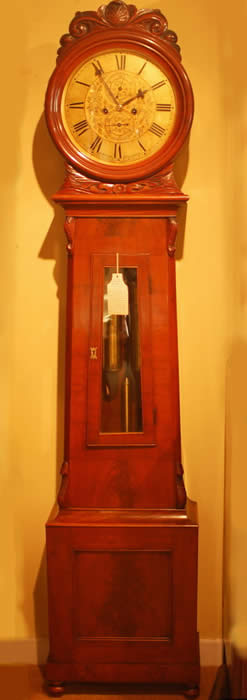 A flame mahogany Scottish longcase in the classic keyhole shape or 