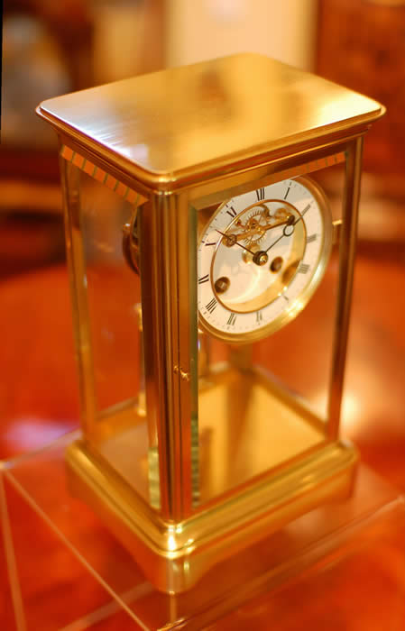 A Superb French four glass , regulator clock, striking the hours and the half hours on a Bell, white enamel dial with Roman numerals and with the center of the dial showing the jewelled 'deadbeat' escapement , bevelled glass all round and a Large sealed mercury compensating pendulum. A fine French 8 day movement and polished blue steel Breguet Hands. The dial is signed by J.Smith of Kendal (although the name is slightly worn) he is recorded working from 1853 to 1879 , this fine clock would have been made circa 1870 standing 11 and half inches Tall . 