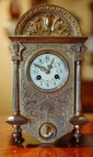 A Gilt Brass Mantel Clock