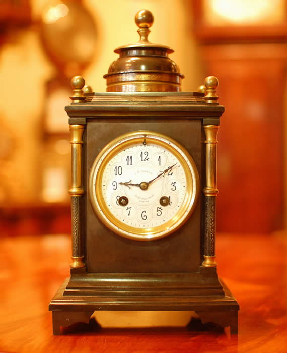 J.W.Benson Mantel clock with Hourly Strike and once on the Half hour in a Bronze case 