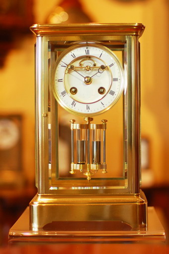 A Superb French four glass , regulator clock, striking the hours and the half hours on a Bell, white enamel dial with Roman numerals and with the center of the dial showing the jewelled 'deadbeat' escapement , bevelled glass all round and a Large sealed mercury compensating pendulum. A fine French 8 day movement and polished blue steel Breguet Hands. The dial is signed by J.Smith of Kendal (although the name is slightly worn) he is recorded working from 1853 to 1879 , this fine clock would have been made circa 1870 standing 11 and half inches Tall . 