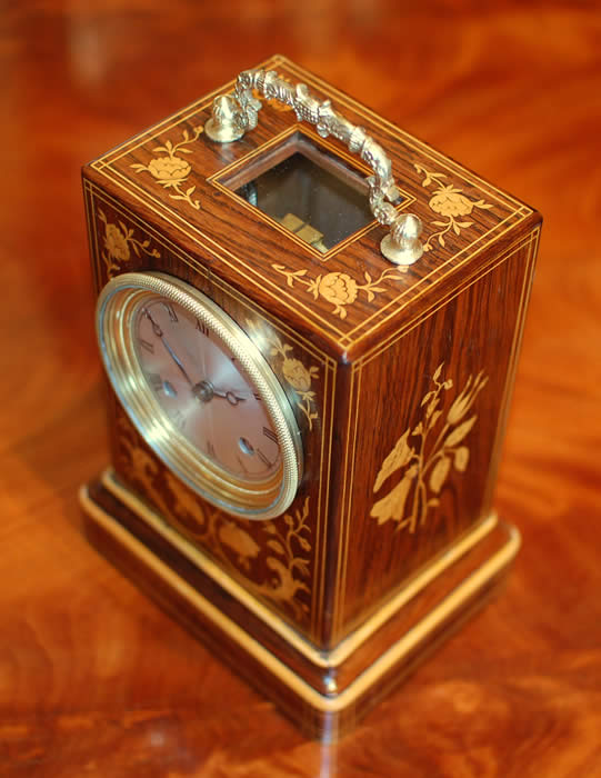 A very fine marquetry inlaid rosewood mantel clock of superb proportions, very good colour and patina with small lenticel below the decorative handle to view the original and highly unusual 'single Chaff cutter' escapement , The 3