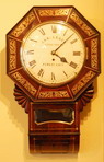 Fusee Drop dial wall clock in rosewood by Charles Leach of Woodford Rd Forest Gate    