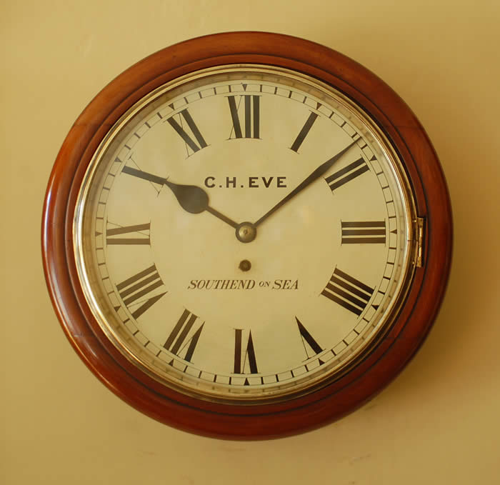 A fine 12 inch Dial clock by C.H.Eve of Southend on sea  Essex in Mahogany with fusee movement . 
