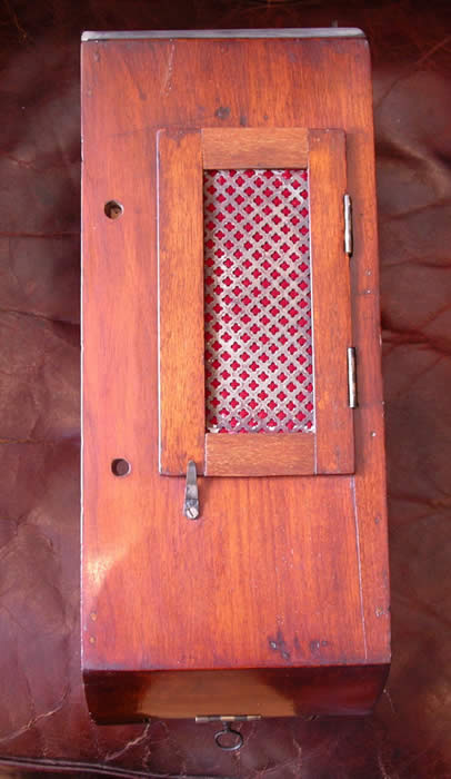 A rare 12" British double fusee wall clock in a mellow , mahogany case. The movement is very substantial with a five pillar ,Chain fusee and square plates